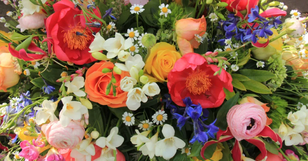 Colorful mixed bouquet with orange, pink, yellow and purple flowers, a friendly platonic gift